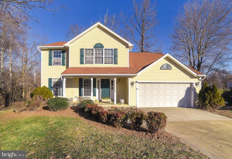 Home Sweet Home! Well maintained colonial with 4 spacious bedrooms and 3.5 baths. Welcoming foyer with gleaming hardwood floors. Kitchen with stainless steel appliances, breakfast bar/island, and flooded with natural light! Step down family room off kitchen with ceiling fan and french doors to the back deck. Formal living room for those  special occasions. The floor plan will make entertaining a breeze. Master suite on upper level has vaulted ceilings, hardwood floors, TWO walk in closets, and attached lux bath with sep shower, dual sinks & a soak tub! 3 additional spacious bedrooms and shared bath on upper level. Finished lower level is the perfect Rec Room and/or 2nd family room....complete with a full bath! The deck off the back will be great for summer BBQs or any get together. Deck overlooks fenced backyard. This house will sell itself....just open the door!