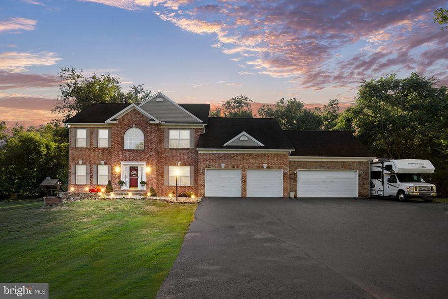 OPEN HOUSE SATURDAY 9/23 10:00-1:00! Welcome to your very own PRIVATE RETREAT! This great property is in small community of only 8 homes. There is definitely a rural, away from everything feel to this home, yet you are close to all desired amenities.  Driving up to the home you'll notice that it sits back far enough from the road for privacy and to accommodate several vehicles should you have the need for additional parking. The current owners also widened the drive to accommodate an RV or boat! The 4 car garage will take care of your needs for covered parking and storage. Step inside the front door to the 2 story foyer with real hardwood floors and lovely staircase. On each side of the foyer you'll find rooms to use as you wish for an office/study/sitting room/playroom, etc. There is also a powder room off the foyer for guests. Next up on the main level is the cook's kitchen to include-large island with pendant lighting, stainless appliances, quartz countertops,  double wall ovens, cabinets with pull out drawers and table space.  The kitchen opens to the large family room with cathedral ceilings and lovely propane fireplace for those cool nights ahead. Rounding out the main level is the formal dining room and the outside living space to include a huge 16x40 deck with electric Sunseeker awning for shade, a new above ground swimming pool with cover, a patio with fire pit and a gorgeous, professionally designed koi pond with waterfall.  The sellers find sitting on the deck listening to the water in the evening so relaxing. The property is simply gorgeous at night, lit with soft outdoor lighting.
Back inside on the 2 level, there are 4 generously sized bedrooms, 3 of which have walk in closets! The primary bedroom has an en-suite bath with separate vanities, soaking tub and separate shower.  There is an overlook from the upstairs hallway to the family room below. 
Finally the lower level is where you will find a completely finished in-law suite with living area, bedroom space, kitchen, and laundry area. The in-law suite has french doors exiting to a large patio area.
All this on over an acre, with part of the backyard privacy fenced.  Plenty of extra storage in the huge attic above the garage. Don't wait to schedule your showing today and make this home yours! 1 year home warranty conveys to new buyer!