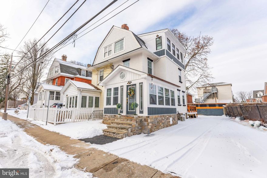 Better than new! All the benefits of new construction without the increase of taxes! Welcome to 56 S. Warner Avenue, a stunning 4-bedroom, 3.5-bathroom twin home nestled in the heart of Bryn Mawr. Location doesn’t get better than this—situated just off the vibrant Lancaster Avenue, you’re moments away from an array of restaurants, shopping, and local entertainment. A highlight of this home is a grandfathered college rental license, providing a great opportunity as an investment property. This home offers the perfect blend of convenience and comfort! This home is almost entirely rebuilt! A new roof, new stucco, energy efficient siding, new doors, new fences, new plumbing, new electric, a new air conditioning system, recessed lighting throughout, and an EV charger in the driveway. All finishings including flooring, walls, paint, energy efficient windows, and appliances are brand new as well. As you enter, you'll be greeted by a bright and inviting four season multi-function room, with tile floors that flow seamlessly into beautiful oak hardwood floors throughout the living spaces. A vaulted ceiling, chandelier, and an abundance of windows flood the home with natural light, creating an open and airy feel. The relaxing room flows into a charming office space featuring a striking brick accent wall and a cozy cove perfect for your desk. Next you will step up to the spacious living room, where you’ll find an elegant electric fireplace with a wooden mantel as the focal point of the space. A stylish powder room with tile floors is conveniently located just off the living room. The well-appointed kitchen is designed for both functionality and style. It features a central butcher block island with seating for 6, a matching butcher block window sill, sleek quartz countertops, pot filler, soft close drawers and top-of-the-line Cafe appliances—perfect for preparing meals and entertaining guests. As you head up to the second level, you enter the first bedroom on this floor which is bright and spacious, complete with two windows and an en-suite bathroom featuring tile floors and a tiled step-in shower with a chic sliding barn door. This floor also boasts two additional bedrooms and another full bathroom with a tub/shower combo, offering comfort and convenience for the whole family. The third level is a true retreat! Your master suite along with a sunny sitting room that welcomes you with an abundance of natural light pouring in from surrounding windows.  Off the hallway, you’ll find a laundry area and a luxurious en-suite bathroom featuring bright all around windows, a soaking tub and a separate sauna & jetted combination shower—your private spa escape. The lower level of the home offers a cozy family room, as well as an additional all in one washer and dryer. An unfinished section of the basement provides space for utilities and extra storage. Beyond the amazing features of the home itself, this property is located in the highly sought-after and award winning Lower Merion School District, making it an ideal choice for families. With easy access to I-476 and I-76, commuting is a breeze. Don’t miss out on the opportunity to make this charming and well-appointed home your own. Schedule a tour today and discover everything this beautiful property has to offer!