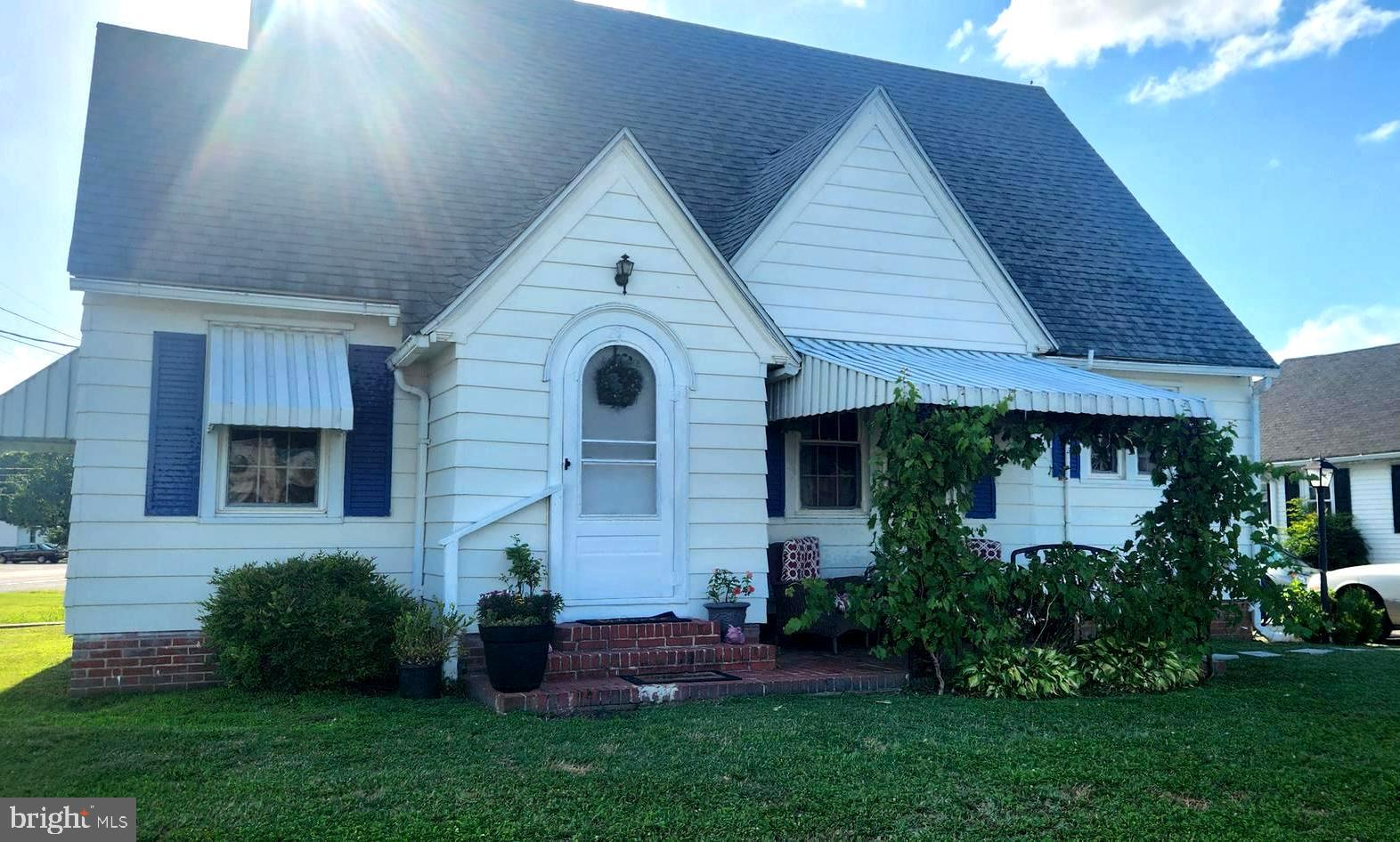 NEW PRICE & 5K to BUYER FOR CLOSING HELP. Discover the Charm & Character of this 4 BR , 1&1/2 Bath Craftsman style home situated on a corner lot, located in the Water Oriented town of Vienna. Within steps to the Scenic views of the Nanticoke River. Some of the best features inside the home are the tudor style arch entryways and the original hardwood floors. The front brick patio offers a quiet space to sit comfortably to read your favorite book or just relax and watch the concord grapes grow as they thrive under the canopy, A delicious and sweet organic treat at your fingertips. This home offers recent upgrades that include a 2 zone new HVAC system, 50 gal hot water heater, stainless appliances , double hung windows and new garage doors. The town of Vienna is rich in history and offers so many amenities in the community including FREE summer concerts at the waterfront pavilion. Vienna is an enhanced living experience. I encourage you to schedule a viewing before its to late...