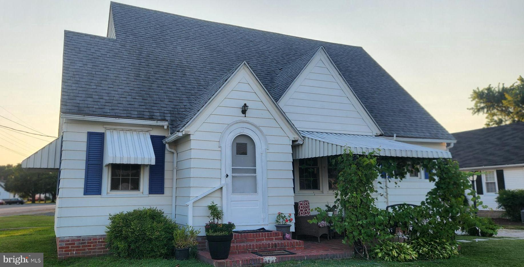 Discover the Charm & Character of this 4 BR , 1&1/2 Bath Craftsman style home situated on a corner lot, located in the Water Oriented town of Vienna. Within steps to the Scenic views of the Nanticoke River. Some of the best features inside the home are the tudor style arch entryways and the original hardwood floors. The front brick patio offers a quiet space to sit comfortably to read your favorite book or just relax and watch the concord grapes grow as they thrive under the canopy, A delicious and sweet organic treat at your fingertips. This home offers recent upgrades that include a 2 zone new HVAC system, 50 gal hot water heater, stainless appliances , double hung windows and new garage doors. The town of Vienna is rich in history and offers so many amenities in the community including FREE summer concerts at the waterfront pavilion. Vienna is an enhanced living experience. I encourage you to schedule a viewing before its to late...