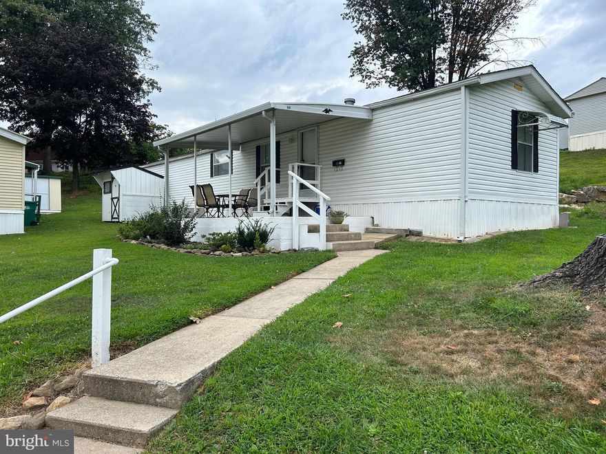 This is a very nicely maintained home in a 55 plus community - Palmdale MHP. This 1993 14 x 60 single wide Schult has two bedrooms and two full bathroom. The home will come with all appliances such as stove, refrigerator, microwave, washer, dryer & shed. All rooms have been painted  and laminate flooring has been installed except for the two bedrooms.New lighting fixtures and fans throughout home.  The second bathroom a has been replaced with a new toilet and vanity. Also the toilet in the master bathroom has been replaced. New windows treatments throughout as well. The back yard and side were completely landscaped and shed had been updated. .
The current lot rent is $420  monthly and includes sewer and snow removal in the park, all buyers must be parked approved as well as adhere to the pet policy which is only one small dog.