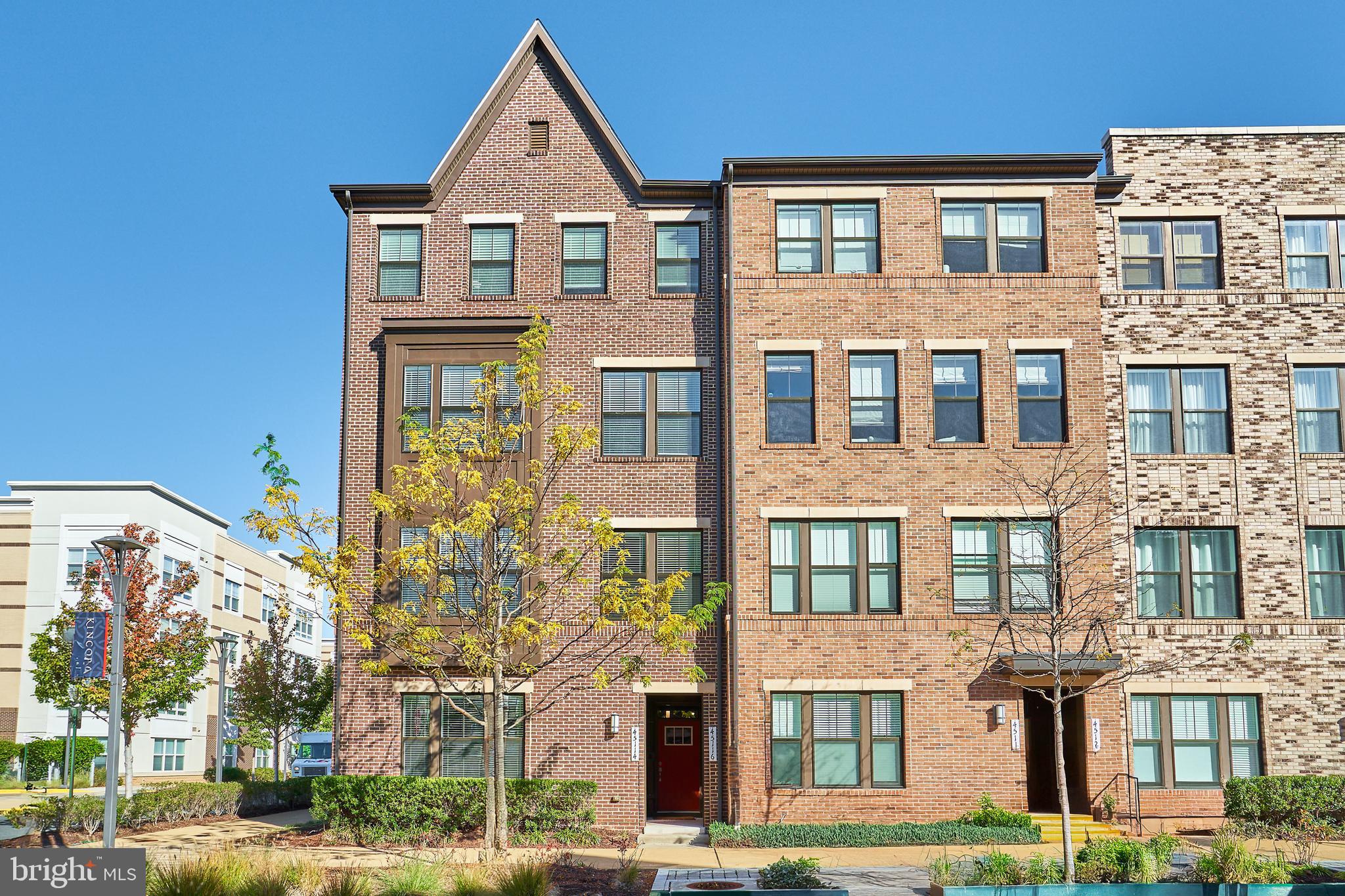 Welcome to this beautifully maintained 3-bed, 2.5-bath end-unit  townhome-style condo with one car garage in the sought-after Kincora community! The main level features a spacious kitchen with stainless steel appliances and an open family room with a cozy fireplace that leads to a private balcony—perfect for relaxing or entertaining. Upstairs, you’ll find a generous primary suite with new hardwood floors,  a luxury bath, and  a walk-in custom closet. Additional rooms are generously sized with ample closet space. Thoughtfully updated with modern light fixtures and fresh paint throughout. Ideally located near One Loudoun, Rt 28, Rt 7, shopping, dining, Dulles Airport, and the much anticipated developments of the Northern Virginia Science Center and PinStack Entertainment. Don't miss out on this one!