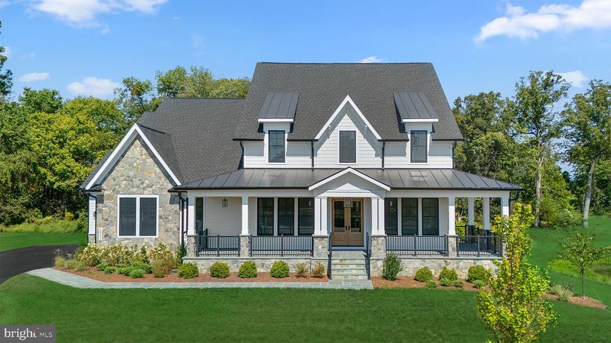 Welcome to the Oatland+ – Homesite 7 at Glenmore Farm—a three-car, side-load garage single family home with five bedrooms, five full bathrooms, and one half bathroom ready for you to move in IMMEDIATELY. Visit our website for more information on our End of Year Savings Event, between 12/08/2025-12/23/25. Thoughtfully crafted, this floorplan pairs luxurious living with everyday functionality. Designed with main-level living in mind, this exceptional home is enhanced with design upgrades, expanded outdoor living features, and curated finishes—making it truly one-of-a-kind. Experience luxury countryside living in this brand new, custom-built home on 3.06 acres at Glenmore Farm by Van Metre Homes. From the moment you arrive, the enhanced elevation—with white Hardie® Plank siding, stone detailing, and Andersen® 400 Series windows—makes a timeless first impression. Inside, nearly 6,000 sq. ft. of beautifully curated space offers 10-foot ceilings, wide-plank hardwood floors, and upgraded trim details including coffered ceilings, crown moulding, and shiplap accents that add architectural depth throughout. The chef’s kitchen is both stunning and functional, featuring GE Café appliances, a six-burner range with griddle and hood, a farmhouse cast iron sink, pot filler, and custom quartersawn cabinetry in two complementary tones. Just off the dining area, a walkout deck and a screened porch with a stone fireplace extend your living space outdoors. The main-level primary suite offers quiet luxury with a spa-inspired bath, complete with dual vanities, custom oak cabinetry, a frameless glass shower, and a soaking tub. Upstairs, every secondary bedroom includes an en-suite bath, while a built-in retreat with window seats provides a cozy, light-filled flex space. The fully finished basement features a spacious rec room, guest bedroom with full bath, and three storage areas—ideal for entertaining or extended-stay guests. Additional thoughtful touches include a finished three-car side-load garage, detailed foyer ceiling treatment, and a main-level laundry room with custom cabinetry and a utility sink. Being a new build, your home is constructed to the highest energy efficiency standards, comes with a post-settlement warranty, and has never been lived in before! Take advantage of closing cost assistance by choosing Intercoastal Mortgage and Walker Title. ------Discover Glenmore Farm, a Van Metre single family home neighborhood destined to become a premier community in the Loudoun Valley area. Offering a distinct small-town feel and access to excellent schools, Glenmore Farm is designed for everyone. Nestled in the bucolic countryside of western Loudoun County, the neighborhood boasts 3+ acre homesites with spacious homes, grand porches, and sweeping views of the Blue Ridge mountains. Just minutes from Waterford and downtown Purcellville, residents enjoy the tranquil ambiance and picturesque surroundings. Glenmore Farm ensures a seamless blend of modern amenities and country living, making it a truly desirable place to call home. With its timeless design, curated finishes, and one-of-a-kind outdoor living features, this home is truly a rare blend of craftsmanship, countryside charm, and luxury.-------*Other homes sites and delivery dates may be available. Pricing, offers, and availability are subject to change without notice. Images, renderings, and site plans are for illustrative purposes only and may not reflect actual homes or features. Some images and renderings may depict interior designs created in collaboration with AI. Additional terms and conditions may apply. Please see a Van Metre Sales Advisor for details.