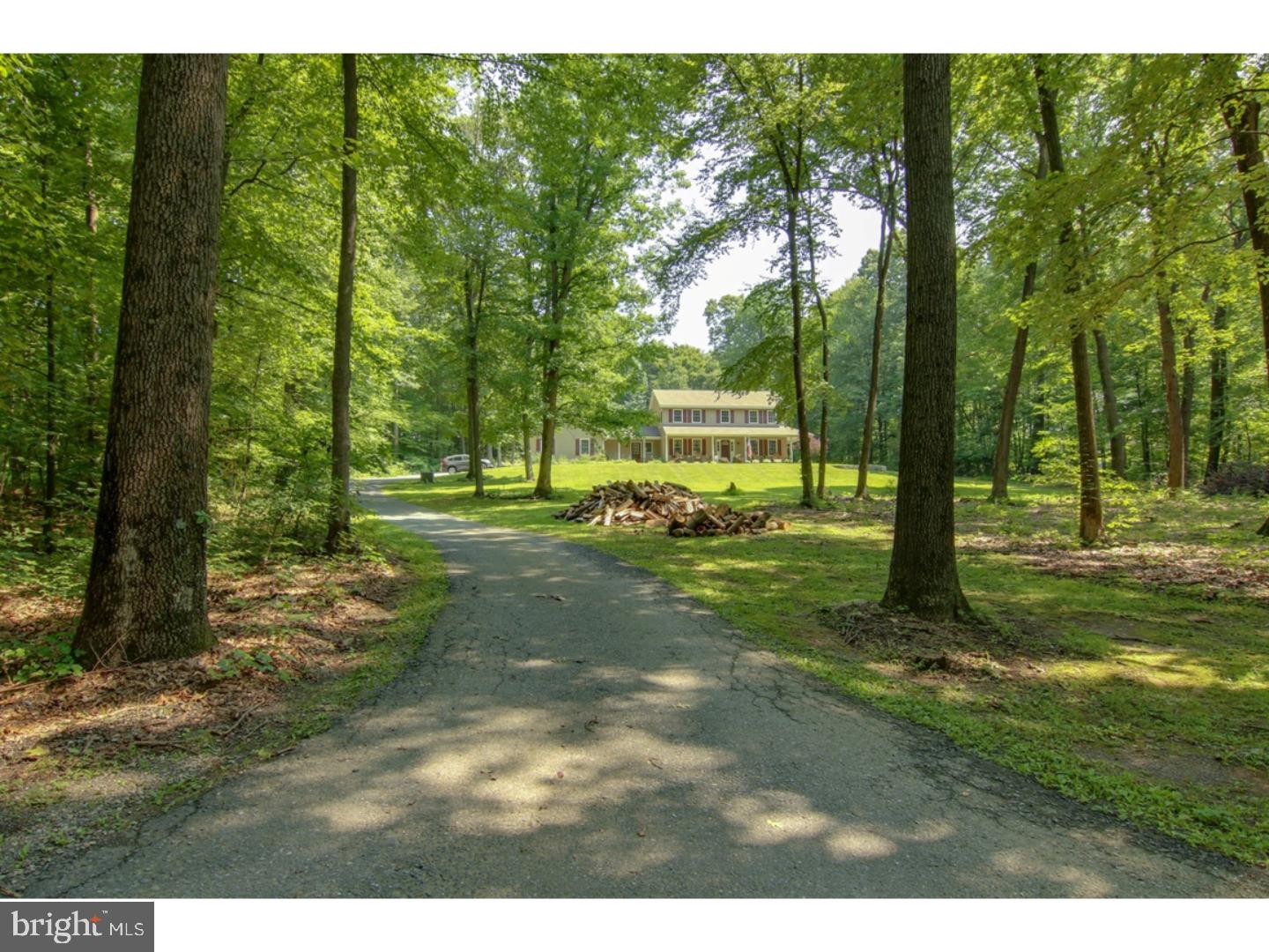 Finally,  the home you've been searching for!  This spacious 2-story colonial sits amid a gorgeous, secluded 3-acre property.  Surrounded by trees and manicured landscaping, you will love the serene setting.  The home has a large wrap-around porch that ends with a cozy gazebo.  Once inside the inviting foyer, you will find a living room/den, formal dining room, a family room, and an eat-in kitchen complete with granite counters and newer appliances.  Also included on the main level is the laundry room, a powder room, and a beautiful 3-season sun room.  The spacious master bedroom upstairs has a large walk-in closet and an en-suite bathroom.  Two more bedrooms, a guest bathroom, plenty of closets, and loft area complete the second floor.  Central Vac System, fresh paint, and brand new carpet are a few extras you are sure to appreciate. The 2-car attached garage has new automatic openers, an abundance of electrical outlets, and enough room for your vehicles with space left over for storage. In addition to the garage, the 30 x 50 detached workshop is sure to impress.  It has everything you could want - 100 amp electric service, concrete floors, insulated walls, air conditioning, oil forced-air heat, a wood stove, and water. You will also appreciate the 18 x 21 carport as well as a separate 12 x 20 shed, perfect for storing lawn equipment or extra "toys".    If you're looking for a peaceful, well-maintained home - this is the place for you!  Call to schedule your private showing today.