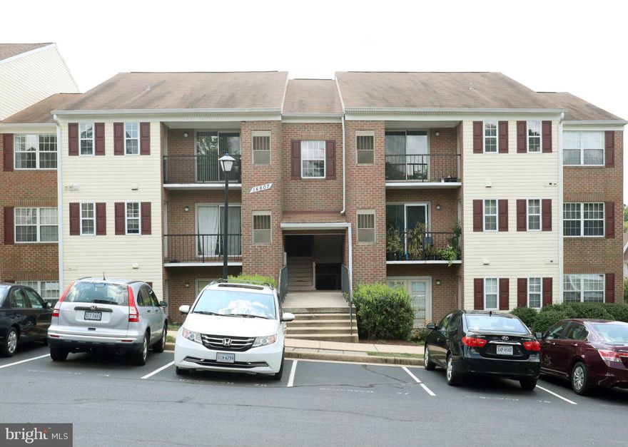 Bright, Beautiful, and Spacious 2 Bed/ 2Bath Condo in Madison Ridge Community. Modern style with light filled rooms. Spacious dining room/living room combination with decorative crown molding.  Granite countertops,  stainless steel appliances and laminate floors. Living room steps out to private balcony. Plentiful parking space for your guests. Clubhouse with large swimming pool, tennis courts, playground, and walking/bike trails. Condo fee includes water/sewer and trash. Close to 66, 28 and 29. A must see home!