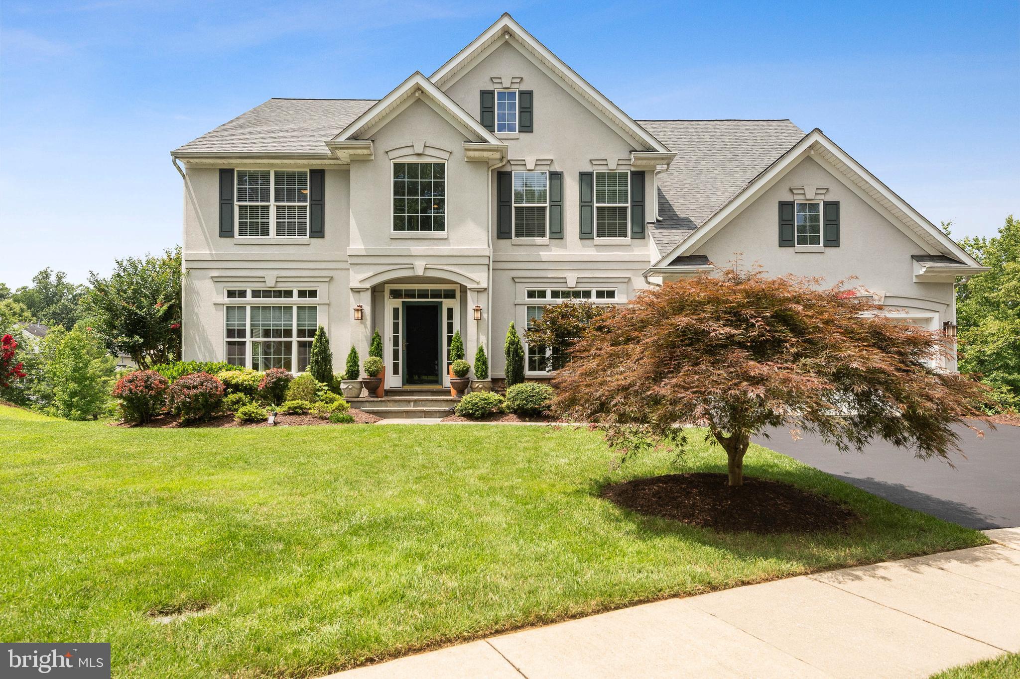 Welcome to this beautifully upgraded 5BR, 4.5BA home in the highly sought-after Marleigh community. With nearly 6,000 total square feet (above grade finished square footage 3,926 plus 1,926 Below Grade square feet), this home offers space, style, and thoughtful updates throughout. The open floor plan features hardwood floors, modern light fixtures, and a gourmet kitchen with upgraded countertops, large center island, double ovens, and a spacious eat-in area that flows into the family room with a cozy gas fireplace.
Enjoy formal living and dining rooms, a main-level office/library, and a bright sunroom that opens to an expansive deck—perfect for entertaining. The upper level offers four bedrooms, including a luxurious owner’s suite with a 3-sided gas fireplace, sitting area, walk-in closet, and spa bath with Jacuzzi tub and separate shower.
The fully finished basement includes a rec room, full bath, and an additional office or 5th bedroom, plus a full bar with wine storage, fridge, dishwasher, and wet bar.
The well manicured lawn has a underground sprinkler system. The English garden in the rear yard is perfect for relaxing.
Community amenities includes a clubhouse, junior Olympic size pool, a baby pool, two tennis courts, walking/bike trails and playgrounds.
Agents: Please remove shoes or wear shoe covers provided at the front door. Sellers need to stay in home for 30 days after Settlement. Prime Title LLC is the Preferred Settlement company.