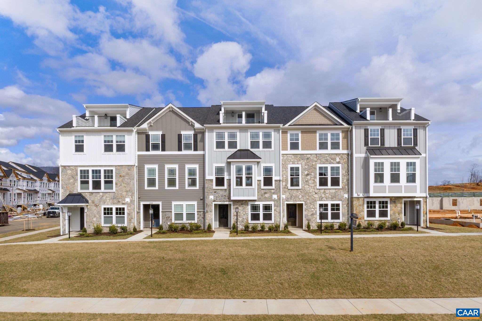 Discover the Holly II, a beautifully designed three-story townhome in the newest section of Belvedere. Fall '25 completion! This stunning home offers a spacious and flexible layout, starting with a rec room and half bath on the first floor, perfect for a home office, gym, or additional living space. The second floor?s open-concept design features a large kitchen with a walk-in pantry, a generous dining area, and a sunlit family room, ideal for entertaining or everyday living, plus an additional half bath. Upstairs, the primary suite provides a retreat with a luxurious en suite bath, while two additional bedrooms share a well-appointed hall bath. The laundry is conveniently located on the third floor, making household tasks a breeze. Thoughtful upgrades like oak stairs with open railings and gas appliances add both style and functionality. A rear two-car garage offers parking and extra storage. Belvedere offers an array of amenities, including access to parks, close proximity to the Rivanna trailhead, the nearby SOCA Fieldhouse, a dedicated dog park for pet owners, and enchanting playground areas. Pricing varies by elevation and structural options. Photos are of similar home and may show optional upgrades.,Granite Counter,Maple Cabinets,Painted Cabinets,White Cabinets,Wood Cabinets