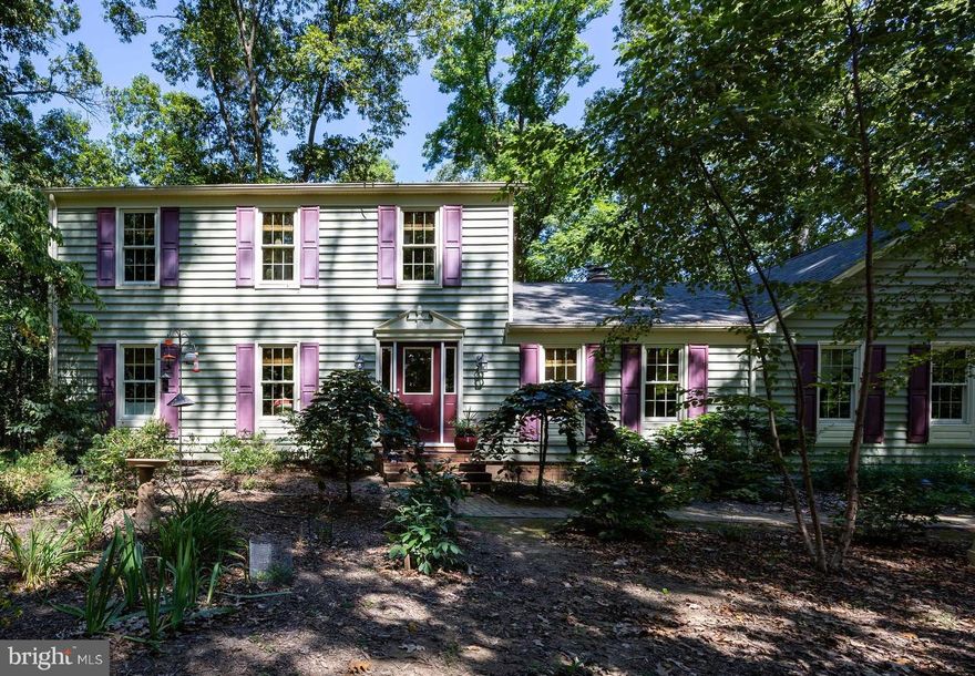 Sellers have made some significant upgrades to the property.  Welcome Home to 321 Acorn Circle, Harpers Ferry, WV! Nestled among towering trees and native plants, this charming colonial offers a private retreat on 2.4 acres with thoughtfully designed outdoor and indoor living spaces.

Since 2016, the owners have made extensive upgrades including a new roof, siding, and windows, making the home both energy-efficient and low-maintenance. Inside, hardwood floors, wainscoting, chair rail, and crown molding blend traditional details with a mid-century modern vibe. The formal living and dining rooms provide inviting spaces for entertaining, while the modernized kitchen is a chef’s delight with abundant cabinetry, granite countertops, and stainless steel appliances. A breakfast area with deck access and a cozy family room with a brick fireplace create a casual gathering place. The sunroom offers year-round views of changing seasons, wildlife, and natural beauty.

Unique features include a convenient pass-through closet in the foyer, a “She-Shed” above the garage perfect for a studio, office, or guest space. Upstairs, the primary suite overlooks the backyard and features a spa-like bath with a whirlpool tub and separate shower. Two additional bedrooms share a newly updated hall bath.

The walk-up basement also offers workshop and storage space. Outdoors, brick pathways connect the landscaped yard, fire pit, raised garden beds, and expansive deck with built-in seating—perfect for gatherings or quiet evenings under the trees.  Priced under a recent appraisal.  Visit this remarkable property today!