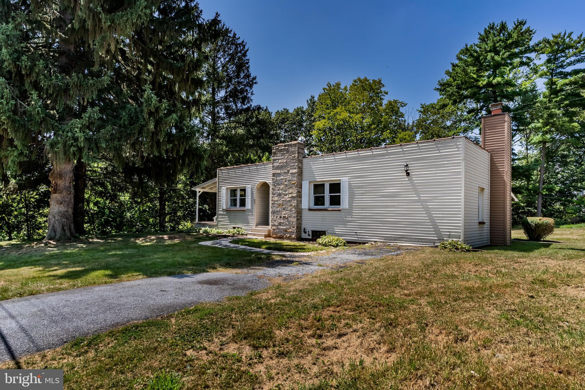 Completely rehabbed ranch-style home offering comfort and charm in a convenient Hummelstown location. This 2 possible 3 bedroom, 1-bath home features a spacious family room with a stunning stone fireplace, perfect for cozy evenings. Enjoy outdoor living with a covered side porch and a covered rear patio overlooking the yard. Fresh updates throughout make this home move-in ready—ideal for first-time buyers, downsizers, or anyone seeking single-floor living. The Family room could also be used as a large Primary bedroom