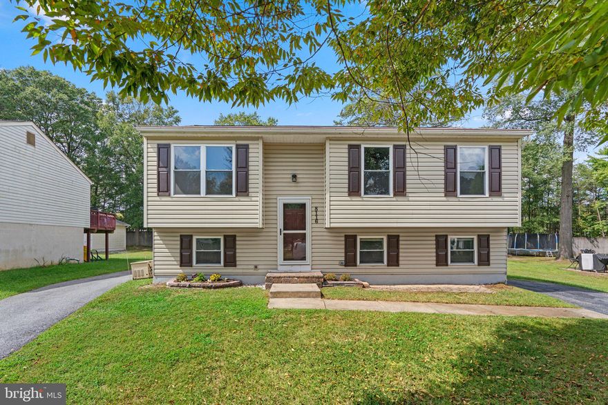 Stunning Move-in-ready 4-bedroom, 2-bathroom split-level residence nestled within a  tranquil neighborhood and just painted!  This home offers an inviting open-concept layout on the main floor, fostering seamless interaction and movement between rooms.  The kitchen has stainless steel appliances and plenty of counter space. The primary bedroom boasts multiple closets, while the remaining bedrooms offer generous space. There is a full bath on this level with tub/shower. The lower level presents an ideal space for a spacious living room, with ample room for an office area or a versatile play/recreation room, an additional  bedroom, full bath and laundry.  Step outside to the backyard, featuring a splendid deck and an impressive two-car garage. The driveway offers abundant off-street parking. Plus, enjoy the peace of mind with a brand new roof! Conveniently located near Ft. Meade NSA and major commuter routes.