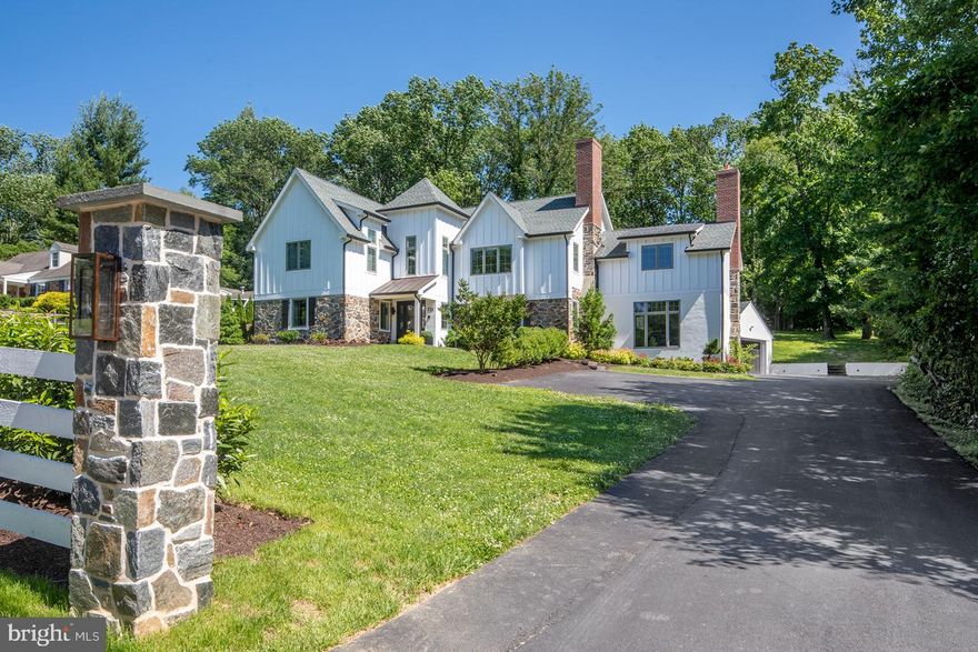 Built in 2017 and meticulously upgraded and improved by the current owners (one of whom is an interior designer), this beautiful Bryn Mawr home is the ultimate modern living space. The great room welcomes you in and features a fireplace, exposed beams, a newly-installed bar with 2 mini-fridges and tons of natural light through French doors leading out to the patio. You ll enjoy hosting family and friends in the fireside dining room overlooking the front grounds. Cooking meals will be an enjoyable experience in your large gourmet kitchen with new subway tile backsplash and hardware, open shelving, and a huge walk-in pantry. Your spacious first floor guest suite with a full bath will have your guests sleeping soundly or get down to business and make it your home office. The family room has a new custom built-in desk and shelving, ideal for the kid's study time or watching tv with a glass of wine. Completing the first floor is a newly added mudroom with custom glass windows & doors, heated floors and a powder room! The second floor has a sprawling master suite complete with his/her walk-in closets, dressing room, and a master bath that belongs in a 5-star spa. The current owners recently added a beautiful window seat, built-in coffee bar with mini fridge, custom built-ins in the closets, electronic shades in the bedroom & bath, and a 3rd HVAC zone to the master suite for ultimate comfort! There are 3 additional spacious bedrooms on this floor with a jack-and-jill full bathroom between two and one that is en-suite. To complete the second floor is the laundry room which has plenty of space for storage. A convenient full bath was recently added to the finished lower level creating the perfect nanny suite. On top of all this, additional upgrades by current owners include: newly installed whole-house generator, Nest thermostats throughout, video camera doorbells, freshly painted exterior and interior, all new light fixtures, speaker system throughout the home, refinished hardwood floors, new landscaping including 20 laurel trees planted and re-seeding, expanded driveway and fencing in the front of the home with 2 stone pillars. This home is a true showstopper and modern luxury living at its best!
