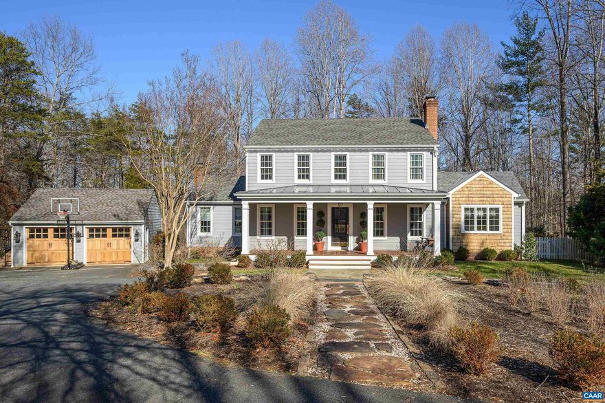 Sited on over 2 private acres in a popular Ivy neighborhood the current owners transformed this home with interior and exterior renovations including a first floor primary suite addition with access to an outdoor shower and private courtyard, new front porch and three season porch fitted with heater, fan and TV, rear deck with composite rails, bluestone patio, fully renovated kitchen with heated floors, new well pump, tank and water filtration system, tesla car charger and extensive finish upgrades.  The covered porch with ipe floors and metal roof opens into the home's foyer which leads into a dining room with wood burning fireplace. The owners converted an area off the dining room and kitchen to a cozy den with built-ins and desk area. The renovated kitchen has soft grey painted cabinetry, new appliances, soapstone island and sunny breakfast room and opens to a large vaulted great room with wood burning fireplace and built-ins.  The first floor primary suite addition includes vaulted ceilings, walk-in closets and a beautiful bathroom with designer finishes.  The second floor includes a second primary suite and 2 additional bedrooms and bath plus den. A detached garage with new doors  offers additional storage.,Painted Cabinets,Soapstone Counter,Solid Surface Counter,Fireplace in Dining Room,Fireplace in Great Room