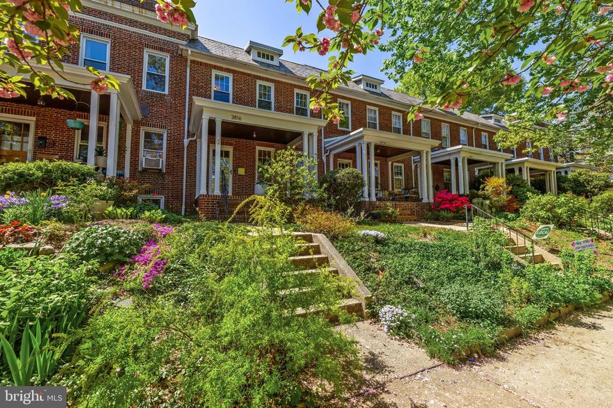 Welcome to this spacious porch-front beauty on a coveted Beech Avenue block. Step into the main level that offers a foyer, large living & dining rooms and a modern kitchen featuring a Bertazzoni range. The second floor features four bedrooms (one currently set-up as a closet system) and a just renovated classy full bathroom. There is a balcony off of one of the bedrooms. The open basement with high ceilings offers great storage, potential additional living space & a flush. The house has been freshly painted, boasts gorgeous hardwood floors, cool light fixtures, natural woodwork & so much more. New windows. Central air (on second floor only) and radiator heat. Aside from the front porch where neighbors regularly gather, check out the rear deck off kitchen, patio and cute backyard. Additionally, the property conveys with a separately deeded double garage (tax id number 13-01-3675A-038  and tax id number 13-01-3675A-039). While this building can certainly supply parking, it offers so much more - electric for car charging capabilities, great hang out space (ping pong anyone?) or even an educational hub as the current owners used for a neighborhood school during COVID. Imagine the possibilities! All of this in highly desirable Wyman Park, a block from the park and steps from all of the Hampden attractions, Rotunda & a more. Boasting a walk score of 88, this is the very best of urban living.