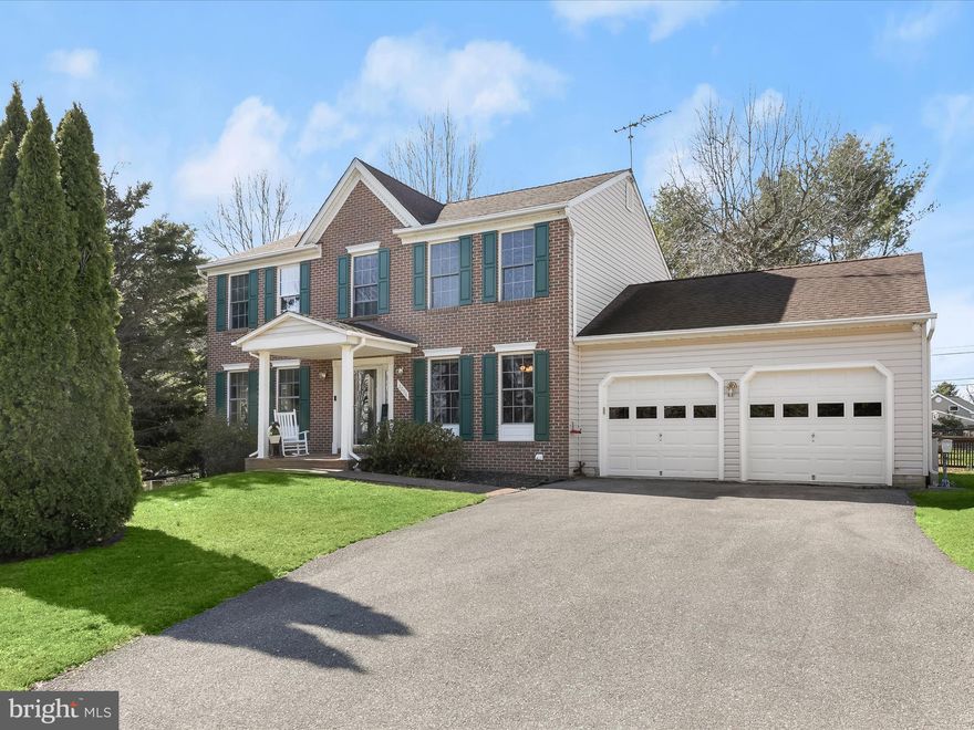 Offering four bedrooms with two full and one half bathrooms, this home is set on a peaceful one-acre lot at the end of a quiet cul-de-sac and has been lovingly maintained by the original owners. A long, tree-lined driveway and a covered front porch create a welcoming first impression. Inside, a bright foyer opens to a living room with a charming bay window and a formal dining room, ideal for entertaining. The kitchen features a pantry, garage access, and a breakfast nook with a door leading to the deck and patio, making it easy to enjoy both indoor and outdoor spaces. The cozy family room invites relaxation with a wood-burning fireplace and a stacked stone surround. A half bathroom completes the main level. Upstairs, the primary bedroom boasts a vaulted ceiling, a walk-in closet, a secondary closet, and an ensuite bathroom with a soaking tub, walk-in shower, and dual-sink vanity. Three additional bedrooms share a full bathroom with a tub-shower. A conveniently located laundry closet finishes the upper level. Downstairs, the lower level includes a recreation room with access to the side yard, offering extra space for fun. A utility room with workbenches and ample storage enhances functionality. Outside, the spacious backyard provides plenty of room for outdoor activities. A storage shed and two chicken coops complete the property. Conveniently located just off Sykesville Rd/Rt. 32, this home has easy access to everything you need.