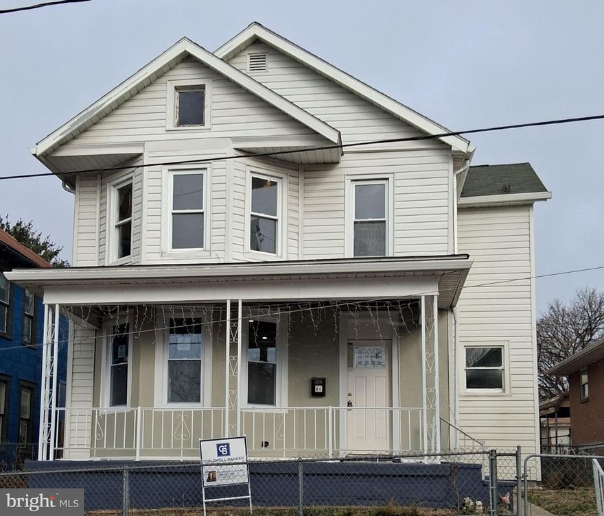 Completely remodeled and newly renovated, this stunning three-bedroom, two-bath residence is a true showpiece. Thoughtfully designed for modern luxury living, the home features brand-new wood and tile flooring throughout, refined finishes, and elegant accent lighting in every space. The open, expansive floor plan is ideal for both intimate gatherings and upscale entertaining, anchored by a sleek electric fireplace that adds warmth and sophistication.

Two beautifully appointed full bathrooms with tub and shower combinations offer spa-like comfort. All bedrooms include closets, with the primary suite boasting a walk-in closet. The home is equipped with brand-new, high-efficiency appliances—all included—along with a brand-new central heating and air conditioning system for year-round comfort. A private carport provides secure parking, completing this exceptional, move-in-ready modern home.