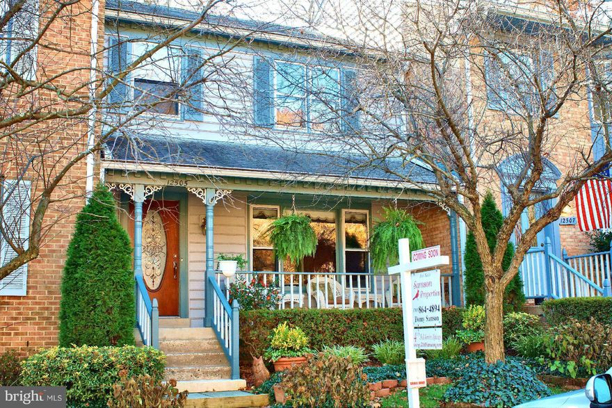 Beautiful 3BR/3.5BA Victorian TH. 1,925 sq ft of updated living space, 2 assigned parking spots. Front porch, wood deck. HW t-out upper 2 levels. Grand LR & DR w/HW & moulding. Updated eat-in KIT w/breakfast area & granite counters, custom cabinets. Renovated MBR suite. Murphy bed.  LL w/FR, gas fireplace, custom built-ins incl an aquarium. Walkout to brick patio w/under deck canopy.