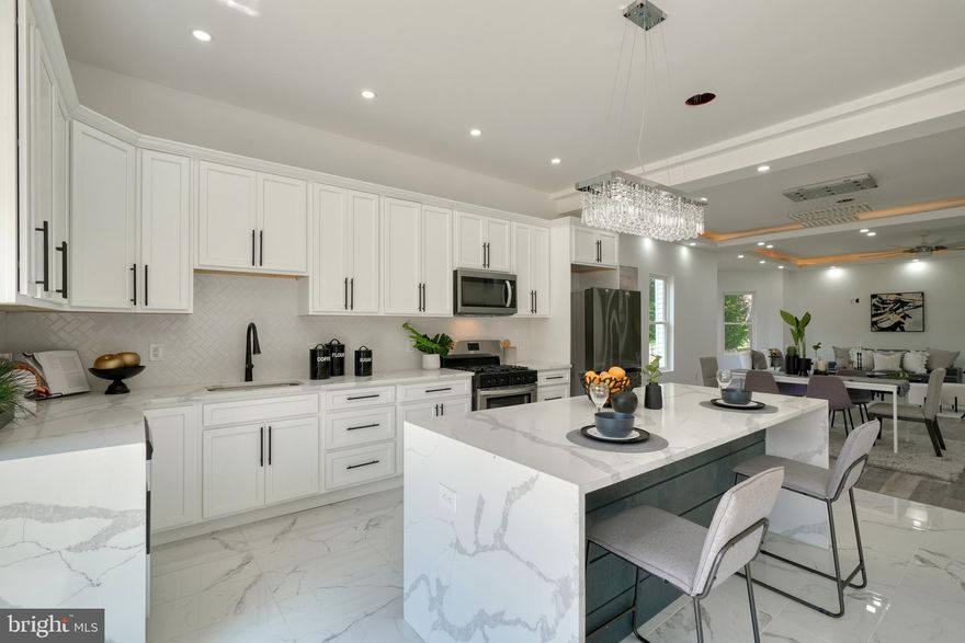 WELCOME TO ARLINGTON MANOR, A ONE OF A KIND, MANSION, SITUATED ON HALF AN ACRE OF LAND! 9 BED/6.5 BATHS! 
**OUTSIDE YOU WILL ENJOY A FULLY FENCED YARD WITH THE BACKYARD HAVING A PRIVACY FENCE, WRAP AROUND PORCH WITH CEILINGS FANS, DECK, LANDSCAPED YARD, MASSIVE NEW ASHPHAULT DRIVEWAY.
**WHEN YOU ENTER THE HOUSE YOU ARE GREETED WITH A 2 STORY FOYER THAT HAS AN ELEGANT CHANDELIER, LIGHTED TRAY CEILINGS, ACCENT WALLS, 2 PRIMARY BEDROOMS WITH EN-SUITE  CUSTOM DESIGNED BATHROOMS ON THE MAIN FLOOR, WALK-IN SHOWER, DOUBLE VANITY, WALK-IN CLOSET, ELECTRIC FIREPLACE, LIVING ROOM + DEN, RECESSED LIGHTING, OPEN CONCEPT FAMILY ROOM/DINING ROOM/KITCHEN. CHEF-LIKE KITCHEN, EXPANSIVE BARSTOOL ISLAND WITH QUARTZ WATERFALL,  CLASSY BACKSPLASH, STAINLESS STEEL APPLIANCES, FRIDGE, OVEN, MICROWAVE, SLIDING DOORS TO A DECK AND BACKYARD, MAIN FLOOR POWDER ROOM WTH CUSTOM DESIGNED TILES.
**COMING UPSTAIRS YOU ARE GREETED WITH AN OPEN LOFT WHICH HAS A WETBAR FEATURING A SINK, BEVERAGE FRIDGE, CABINETS AND QUARTZ COUNTERTOPS - THE LOFT AREA LOOKS OVER TO THE FOYER.  THIS SPACE IS PERFECT FOR A RELAXING EVENING.  THERE ARE 5 BEDROOMS + 3 CUSTOM DESIGNED BATHROOMS ON THIS FLOOR, INCLUDING A PRIMARY BEDROOM WITH ENSUITE BATHROOM WITH CLAWFOOT TUB, WALK-IN SHOWER + WALK-IN CLOSET. HEADING UP TO THE TOP FLOOR IS A LARGE REC ROOM THAT HAS SO MANY POSSIBILITIES OF WHAT YOU CAN USE IT FOR. 
**THE BASEMENT HAS 2 ROOMS, 1 FULL BATHROOM, LAUNDRY HOOKUP, UTLITY CLOSET WITH TWO WATER HEATERS, DUAL ZONE HVAC SYSTEM. COME SEE THIS TODAY SO YOU CAN BE THE PROUD NEW OWNER OF ARLINGTON MANOR.