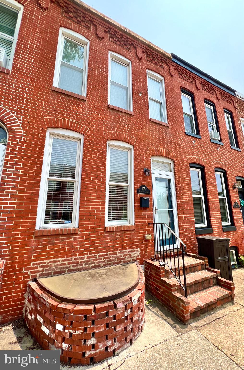 Live in the heart of Canton’s sought-after waterfront neighborhood!
This stunning 3-bedroom, 3.5-bath rowhome combines classic charm with modern upgrades and an unbeatable location. Highlights include a large parking pad and a rooftop deck with panoramic city views—perfect for relaxing or entertaining.
Inside, you’ll love the gorgeous hardwood floors throughout, exposed brick, and recessed lighting on the main level. The stylish kitchen features granite countertops, gray cabinetry, and stainless steel appliances—a perfect space for cooking and gathering. A main-level half bath and washer/dryer add everyday convenience.
Upstairs, the front bedroom features an en suite bathroom, while the rear bedroom is served by a full hall bath. The third bedroom is located in the finished basement and includes its own full bathroom—a great option for guests, a home office, or a quiet retreat. The home also includes dual-zone heating and cooling for year-round comfort.
All of this in a prime Canton location—just steps from the waterfront, parks, restaurants, and everything city living has to offer. Don’t miss it! Live smart. Live stylish. Live Canton.