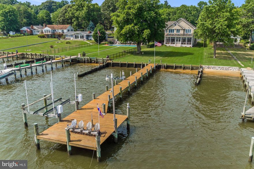 Sweeping views spanning more than 180 degrees from this meticulously kept & captivating property. Year round entertaining made easy with a ringside vantage and access to the Magothy River, & the Chesapeake Bay. Professionally landscaped outside and generously appointed inside. This spacious 5 bedroom home with pier & lift is ready & waiting for you to move right in. Great Location!