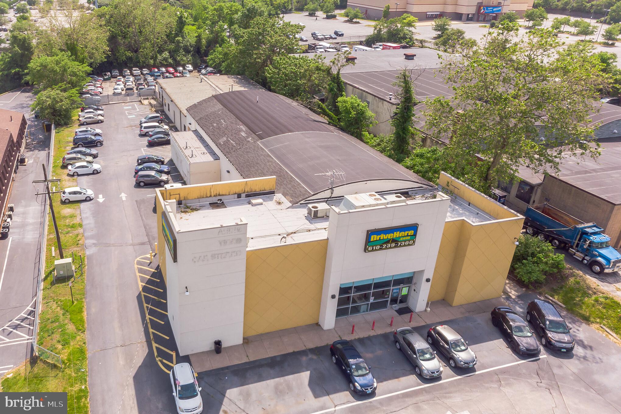 Great direct access from all major road systems. Most major new (and used) car dealerships on Ridge Pike. Direct access to I-476 North and South. Showroom is approximately 8,000 s/f with warehouse attached. Attached 5,000 s/f offices total building is 16,500 s/f sitting on 1.7 +- ac. Owners will consider long term land lease. Property can be purchased for $3.3 million. Rectangular lot 150' X 500'. Available immediately. Previous use was a banquette hall. Clear span 14' to 20' ceilings.