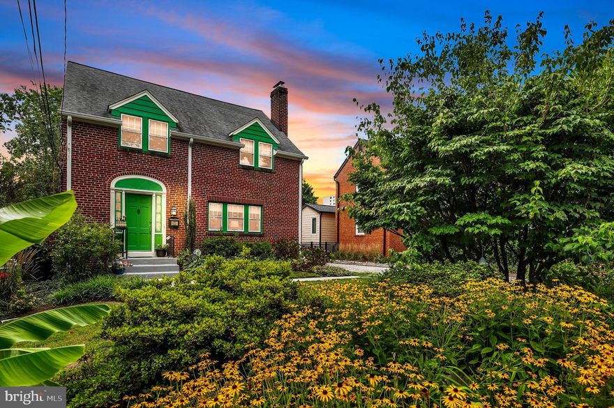 Discover the elegance of this remarkable Colonial home, nestled on a rare 0.25-acre lot in the heart of Downtown Silver Spring. This exquisite 4-bedroom, 3 1/2-bathroom residence showcases a beautifully updated kitchen, adorned with honed granite countertops, a sophisticated subway-tiled backsplash, a spacious pantry illuminated by a skylight, and stainless steel appliances. The expansive owner's suite features a luxurious renovated en-suite bathroom, creating a serene private retreat bathed in natural light.

The gracious living room, complete with a charming fireplace, and the generously sized dining room provide ideal settings for refined entertaining. Ascend to the third-floor attic, which has been transformed into a magnificent open loft, perfect for a home office, creative studio, or additional living space. Rich Chestnut wood accents and gleaming hardwood floors add timeless beauty throughout the home.

The fully finished basement offers a full bathroom, a legal bedroom, and recessed lighting, making it an excellent space for guests or extended family. Step outside to the large deck, adorned with a pergola, perfect for alfresco dining and gatherings. The property also includes a detached 2-car garage and a long driveway, providing ample off-street parking. The deep, setback backyard offers a tranquil oasis for relaxation and outdoor activities.

Located in the vibrant heart of Downtown Silver Spring, this home is steps away from an array of fine dining establishments, a movie theater, Whole Foods, a library, and the Silver Spring Metro. Enjoy the convenience of Bullis Park just one block away and a leisurely stroll to Nolte Park. With an updated roof, a new heating system and a brand new heat pump AC system for the 2nd floor and attic this residence is move-in ready, waiting for you to experience its charm and elegance. Don't miss the opportunity to reside in one of Silver Spring's most desirable neighborhoods.