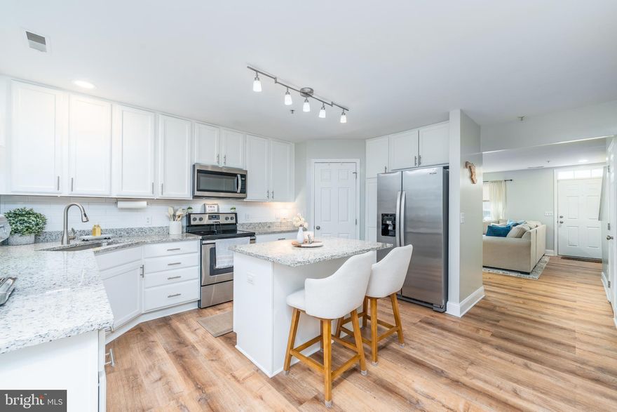 Welcome to 688 Luthardt Road, a charming townhome nestled in the serene Carrollwood Manor community of Middle River, Maryland. This delightful residence offers a harmonious blend of modern updates and classic design, ensuring a comfortable and stylish living experience. The heart of this home boasts a newly renovated kitchen, thoughtfully redesigned with sleek countertops, stainless steel appliances, and ample cabinetry. The addition of a custom pantry provides enhanced storage solutions, catering to all your culinary and storage needs. 

The main living area is graced with beautiful hardwood floors, adding warmth and sophistication to the home's interior. Step outside to an expansive deck, perfect for sipping your morning coffee or hosting gatherings. 

This residence also offers a spacious living room, abundant natural light, and a versatile floor plan to suit various lifestyle needs. The primary suite features an elegantly updated bathroom with modern fixtures, a spacious vanity, and a rejuvenating shower, creating a spa-like ambiance. Situated in a peaceful neighborhood, 688 Luthardt Road provides convenient access to local amenities, shopping centers, and major thoroughfares, ensuring both comfort and convenience. Don't miss the opportunity to make this beautifully updated townhome your own!