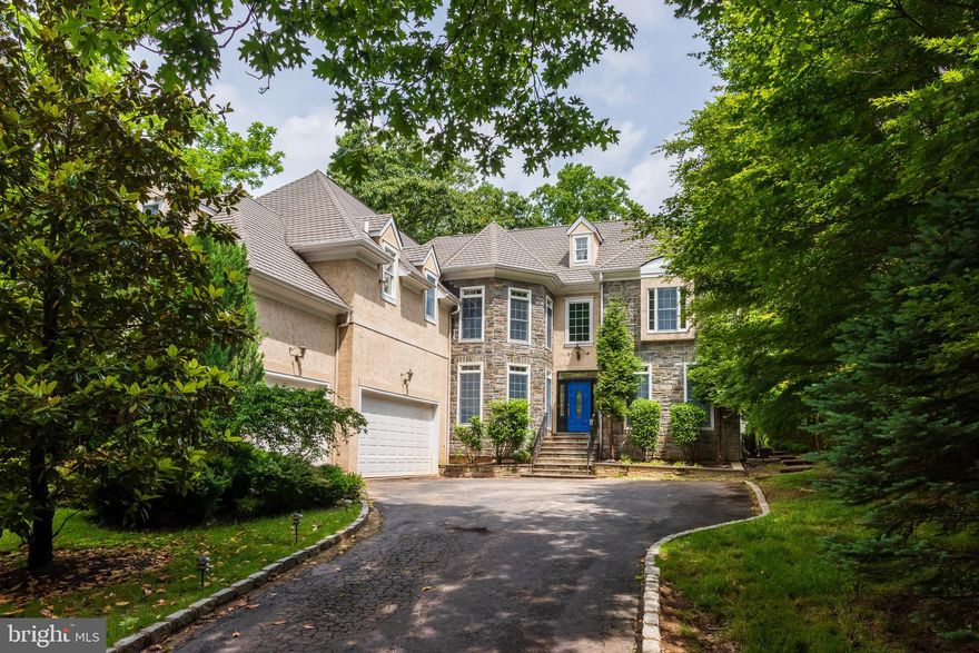 Here is your chance to own a custom home built by Paolino Development, one of Main Line's premier builders.  If your home is your castle, then this home design is for you.  A stunning stone turret makes for eye-catching curb appeal. More great surprises await you inside. A vaulted keeping room adjoins the kitchen area providing a warm and comfortable spot to spend casual time with family and friends chatting with the cook of the house. The dramatic two-story foyer leads to a spacious great room with a fireplace and walls of windows permeating light throughout.  The interesting circular-shaped dining room is an ice-breaker and gives guests something to chat about as they get acquainted. To the right of the foyer is a living room that may serve as an office, music room, or library. The spacious first-floor bedroom with a full bath is perfect for overnight guests, multi-generational living, or aging in place.  Completing the main floor is a large laundry mudroom combo, a formal powder room, and a large storage pantry. Step upstairs into the luxurious owner’s suite featuring a uniquely shaped sitting area, a relaxing spot to retire at the end of the day. The two large walk-in closets provide plenty of space for the clothes lover. The master bath features an oversized shower, individual vanities, two separate sinks, and a soaking tub.
In addition to the owner's suite, there are three additional bedrooms-one ensuite and two that share a full bathroom each with a private sink vanity wash area.   And wait there is so much more! The finished walk-out lower level includes an expansive family room with three additional rooms to be used as office space, storage, or closet space.  One of the rooms has an adjoining full bath with a shower making it the perfect workout room. All this in the highly-rated Radnor School District! The convenient location is close to entrances for I-476, I-76, downtown Wayne, and the Paoli-Thorndale train to Philadelphia.