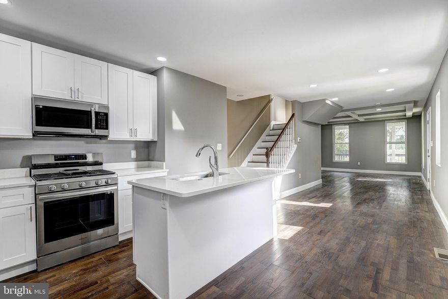 Welcome to 4220 Parkmont Ave, located in the heart of Baltimore, MD 21206. This stunning residence is a true gem, boasting four bedrooms and three and a half bathrooms. As you step inside, prepare to be captivated by the allure of hardwood flooring, enhanced by elegant tray ceilings and the warm embrace of recessed lighting. Freshly painted walls throughout the home create a canvas ready for your personal touch.

The gourmet kitchen stands as a masterpiece, featuring brand-new stainless steel appliances that harmonize perfectly with the quartz countertops. The interplay of recessed lighting and bright white, self-close cabinetry enhances both the aesthetic and functionality of this culinary haven. A convenient half bath on the main level adds a touch of practicality to the splendid surroundings.

Ascending to the upper level, you'll discover hardwood floors, two generously proportioned bedrooms, each offering its own unique charm. The full bathroom on this level has undergone a complete transformation, boasting a remodel that includes tasteful subway tile and a niche within the shower—a harmonious blend of sophistication and practicality.

Continuing upwards, the journey leads to two more bedrooms that embrace a modern aesthetic. The fully renovated bathroom on this level exemplifies contemporary design and craftsmanship at its finest.

The basement of this remarkable home features luxury vinyl panel flooring and inviting recessed lighting, creating an ambiance of comfort and relaxation. The outdoor space is a true sanctuary—a dream backyard offering an abundance of space for your creative vision.

Every aspect of this residence has been meticulously renovated from top to bottom, resulting in a harmonious blend of modern amenities and timeless style. Nestled in the sought-after Belford neighborhood, this location provides easy access to major highways, ensuring your daily commute and weekend explorations are effortlessly convenient. Enjoy proximity to an array of dining establishments, shops, and entertainment venues, making every day a new adventure.

Other major updates include new furnace, new AC unit and new hot water tank!

Don't miss this opportunity to make 4220 Parkmont Ave your new home. Experience luxury, convenience, and elegance combined in one unparalleled package. Schedule your private showing today and step into a new realm of refined living.

***LOT SQFT IS AN ESTIMATE. BUYER RESPONSIBLE FOR THEIR OWN DUE DILIGENCE***


***OWNER IS STILL IN AN ACTIVE LISTING AGREEMENT WITH LISTING AGENT.***