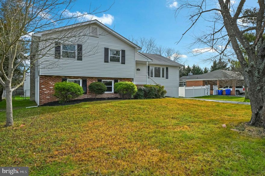 Wonderfully remodeled and updated split level in the great neighborhood of Cloverfields. New hardwood floors on the main level including bedrooms. All new kitchen including stainless steel appliances, quartz countertops and Wolf Classic soft close door/ drawer cabinets. New bathrooms. New doors. New electrical devices and lighting. New carpet in lower level. Oversized detached two car garage.