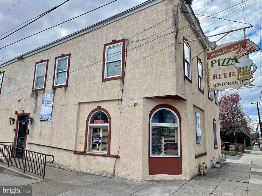 Amazing investment opportunity for the right buyer looking for a turn-key restaurant business with a Type R liquor license! Currently being used as a fully functioning restaurant, bar/beer sales, and convenience-related items.  All trade fixtures are a part of the sale including two brick pizza ovens, two walk-in coolers, 1 walk-in freezer, 7 beverage refrigerators, ovens, grills, frying machine, an ice maker, and other related restaurant equipment. There are 5 slot machines for additional foot traffic and passive income.  There are 2 apartments on the second floor - a 2 bedroom and 1 bedroom apartment which are currently vacant (but can easily be rented). The liquor license is Type R, which is top tier! There’s a dining area with plenty of seating and two recently updated restrooms.  The options are endless for the new owner to realize their dream of a fully functioning restaurant and bar with income-producing units above! There is plenty of parking (6 cars total between the back and side of the building). Don’t miss your chance, schedule a showing today!