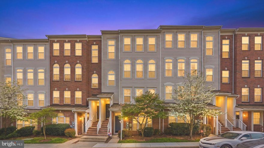Beautifully maintained and move-in ready 2BR/2.5BA Townhome located on the ground floor in the quiet neighborhood of Village of Mill Run.  Step inside to a home filled with natural light, luxury flooring, high-end lighting fixtures, crown moldings, and a soft color palette.  The main floor offers an open floor plan featuring a spacious living room with a gas fireplace, a sizable dining area, a half bath, and a kitchen.  The kitchen features plenty of cabinets finished with crown molding, abundant counter space, a tiled backsplash, stainless steel appliances, and a double stainless sink under a raised wall that allows a view into the main living space.  Tucked behind the kitchen is a half bath and access to the attached one-car garage. The second floor features an open loft space ideal as a family room, sliding doors to the spacious balcony overlooking the community, second floor laundry, a large secondary bedroom with a full bath, and a grand sized primary suite.  The primary bedroom offers a large walk-in closet, a second closet, and a private full bathroom with a double sink vanity and a deep soaking tub/shower. This home offers new homeowners much and is located near shopping, restaurants, and commuter routes.