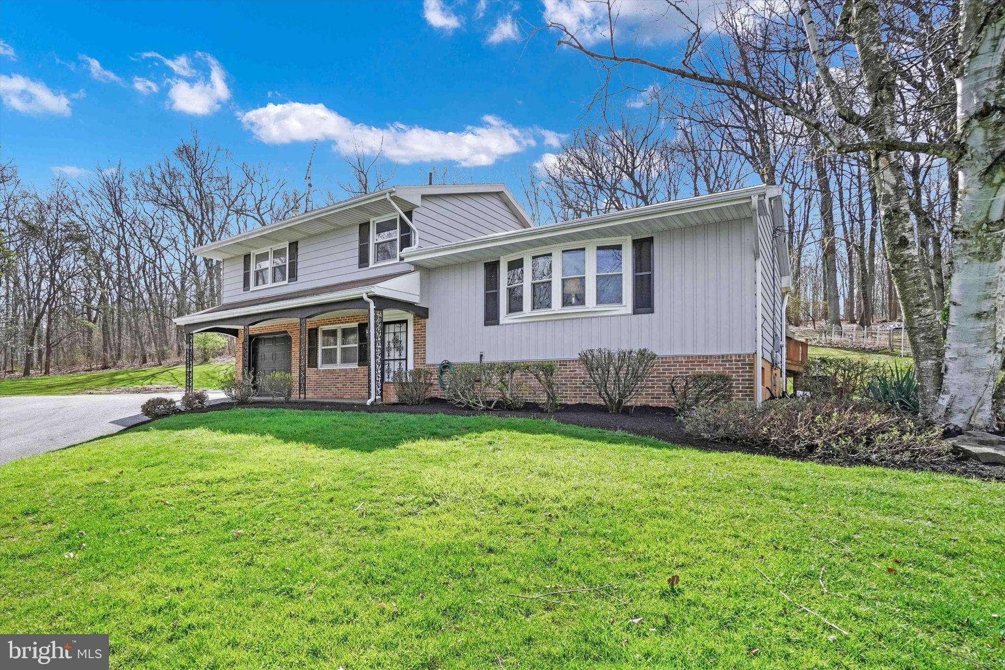 Welcome to your serene retreat!  Offers lots of potential!  Spacious main residence features 3 bedrooms, 1.5 baths! Located in Northeastern York school district property includes oversized garage with office and private in law suite! This home presents endless possibilities for customization and expansion! Beautiful 1 acre partially wooded property!