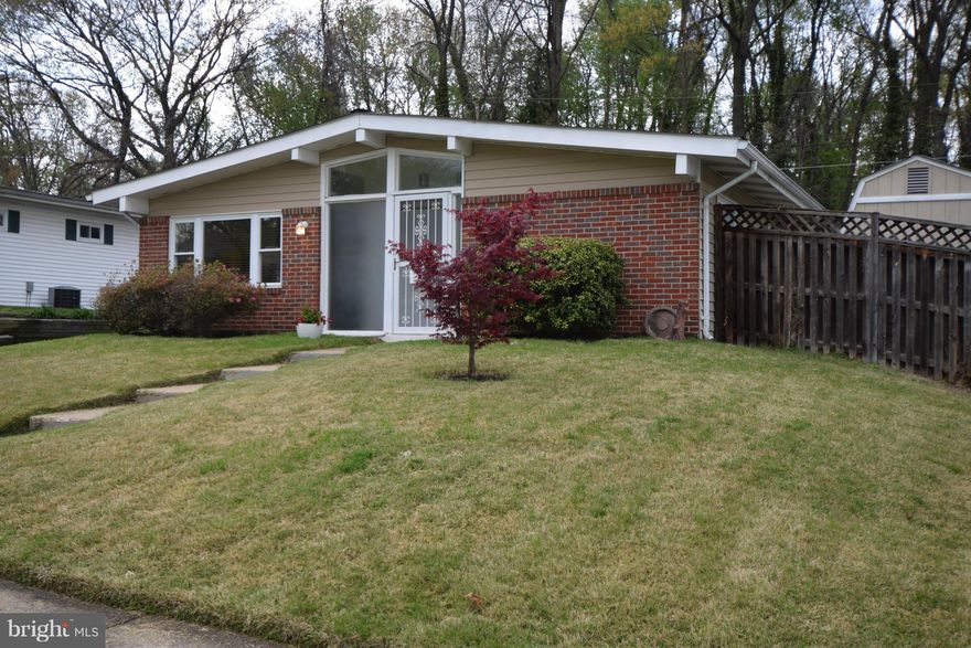 This well maintained rancher is freshly painted, with new carpet in the living room and hallway, updated bathrooms with granite counter tops in the kitchen.  Great starter home with a large fenced yard.