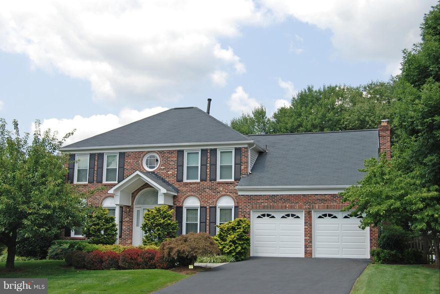 Motivated seller! Bright and sunny 5BR/4 BA home in a beautiful neighborhood. Large living and dining rooms. Spacious kitchen w/breakfast area. Expansive 2 level deck w/hot tub off family room overlooking gorgeous landscaped yard.Great for entertaining. Main level BR/study w/access to full BA. 4 BR's on UL.  MBD suite w/ shower and soaking tub, double sink.Finished LL. 2 car garage.