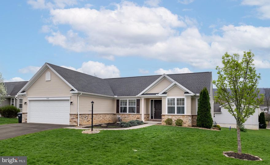 Lovingly maintained, modern ranch in Steeplechase offers it all. Sunlight pours into the open living areas, highlighting a warm hardwood living room that flows effortlessly into the dining space. The kitchen showcases quality appliances, granite countertops and beautiful cabinetry that provides abundant storage while blending style and functionality. The sunroom, full of expansive windows, opens to the deck and backyard—perfect for entertaining. The main-floor primary suite is spacious and features its own full bath, thoughtfully positioned apart from the two additional bedrooms and full bath for added privacy. A first-floor laundry adds everyday convenience. Envision your own setup in the lower level, featuring a spacious room with a wet bar and full bath—an adaptable space ready to fit your lifestyle. Additional highlights include a two-car garage and a prime location just 15 minutes from State College with easy access to Bellefonte.