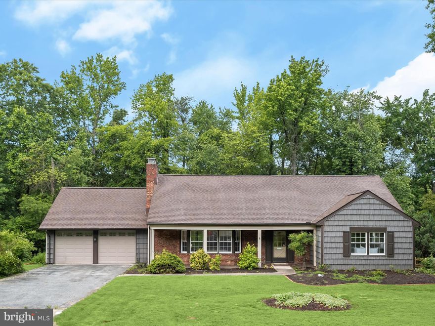 Welcome to this beautifully updated Cape Cod in the sought-after Montpelier community of Laurel! Showcasing timeless brick and shingle aluminum siding, this spacious home has been thoughtfully renovated from top to bottom. Step inside to find brand new luxury vinyl plank flooring on the main level and plush carpet upstairs, all enhanced by a fresh modern color palette and updated lighting and electrical package throughout the home.  The sun-filled living room features a charming bay window, recessed lighting, and a cozy wood-burning fireplace. Entertain with ease in the formal dining room with stylish lighting and a seamless flow into the newly renovated gourmet kitchen. Highlights include soft-close shaker cabinetry, granite countertops, stainless steel appliances, and a peninsula breakfast bar. The kitchen opens to a cozy breakfast area that connects to the oversized laundry room, the 2-car garage, and a private brick patio, perfect for outdoor entertaining.  The main-level primary suite offers comfort and style with plush carpeting, a double-door closet, and a fully renovated en-suite bath with a walk-in shower. An additional bedroom and a beautifully updated hall bath complete the main level. Upstairs, you’ll find three spacious bedrooms, all with new carpet, a fully renovated hall bath with a tub/shower combo, plus a linen closet and dedicated storage room.  Additional features include a 2022 hot water heater and easy access to major commuter routes, including US-1, US-29, I-95, and MD-295. Convenient to Columbia Mall, Merriweather Post Pavilion, downtown Baltimore, and Washington D.C., this move-in-ready gem offers comfort, style, and location all in one! Due to holiday, offers due 10 PM, Tue 6/3, seller reserves right to accept an offer prior to 6/3.