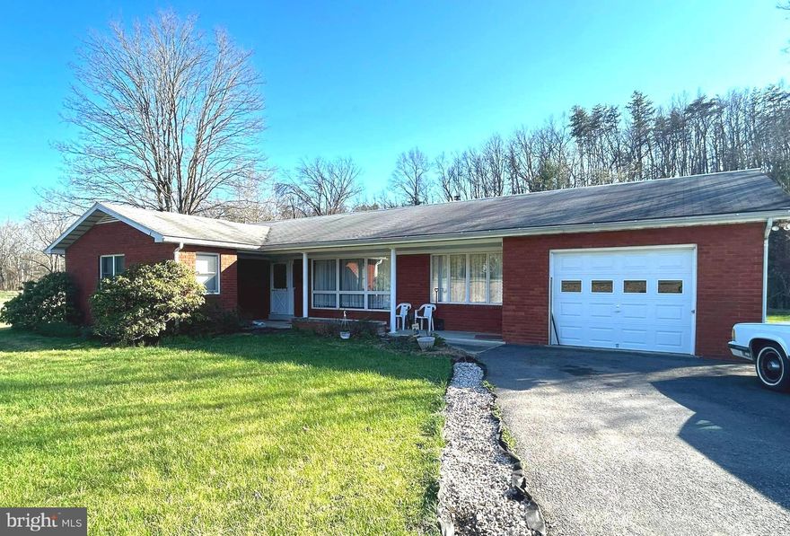 Beautiful, well maintained 3 bedroom 2 bath total brick rancher with blacktop drive conveniently located on Route 46 halfway between Keyser and Fort Ashby in the Frankfort School District .   Attached one car garage, detached one car garage and additional storage building.  Eat in kitchen with updated cabinets and luxury vinyl flooring.  Dining room with chair rail and luxury vinyl flooring.    Spacious living room with large windows.  Family room features a fireplace with wood burning insert. Large back patio and large yard.