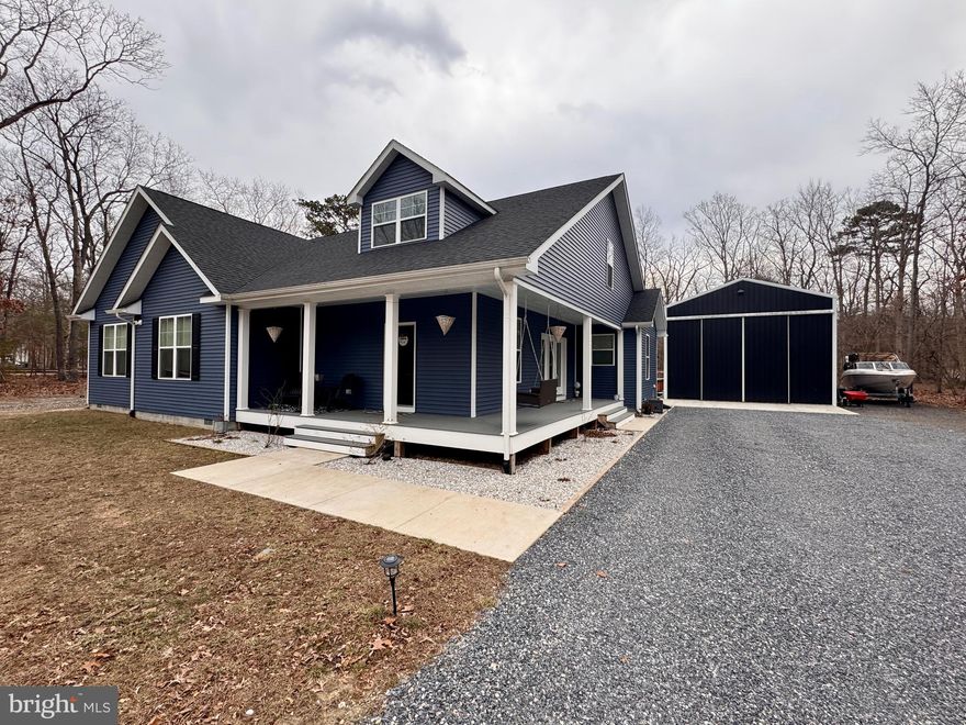 Check out this beautiful 2023 build. With a wrap around front porch and 24'x 30' pole barn with 2 14' pull through doors. Currently finished off as a 3 bed/ 2.5 Bath on the main floor with the upstairs roughed in for a 4/5th bedroom and a full bath or optional bonus room.  Wide open floor plan, spacious kitchen great for entertaining with stainless appliances, granite counters, bar height end top, 2 large islands. Durable LVP Flooring through out the main living area with carpeted bedrooms. Supplemental pellet stove heat for those super chilly days. Large primary with walk in closets and an over sized bath, dual vanities, large tile shower with dual shower heads &  built in's. 2nd bath close proximity to the 2nd & 3rd bedrooms. Full sized laundry room with sink. Outside you'll find side walks taking you out to your large shop or pool with wrap around deck and swings. Plenty of room out back for all your animals, large fenced in area and a chicken coop. Also a second outdoor shed with lean-too for even more storage.