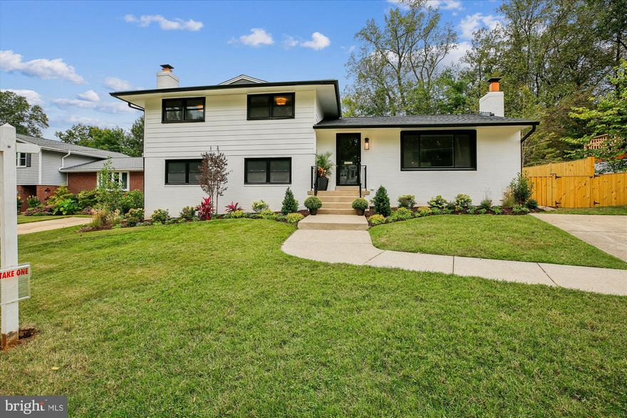 Stunningly renovated 4BR/3.5BA home in sought-after Wyngate! This elegant residence at 6405 Hollins Dr offers 2,696 SF of stylish living space with thoughtful updates throughout. The main level features a bright living room with fireplace, a separate dining room that opens to a screened-in porch—ideal for entertaining. The brand-new kitchen is a chef's and entertainer's dream, boasting quartz countertops, custom cabinetry, stainless steel appliances, and a spacious center island. 
Upstairs you'll find a serene primary suite with a renovated ensuite bath and a walk in closet, two additional bedrooms, and a beautifully updated hall bath. 
The lower level offers a second family room with a fireplace, a 4th bedroom, renovated full bath, and powder room—perfect for guests or a home office. Continue down to the finished basement which includes a large recreation room, laundry area, and ample storage. Enjoy outdoor living with a generous deck and a flat, large fenced backyard beautifully landscaped.
 With refinished hardwoods, a new roof, and new windows, this home is move-in ready for those seeking  modern upgrades and timeless charm in a prime location.  Ideally located near NIH, parks, top-rated schools within the WJ School Cluster, shopping and restaurants of downtown Bethesda, don't miss the oppooortu ity to live in this sought after location!