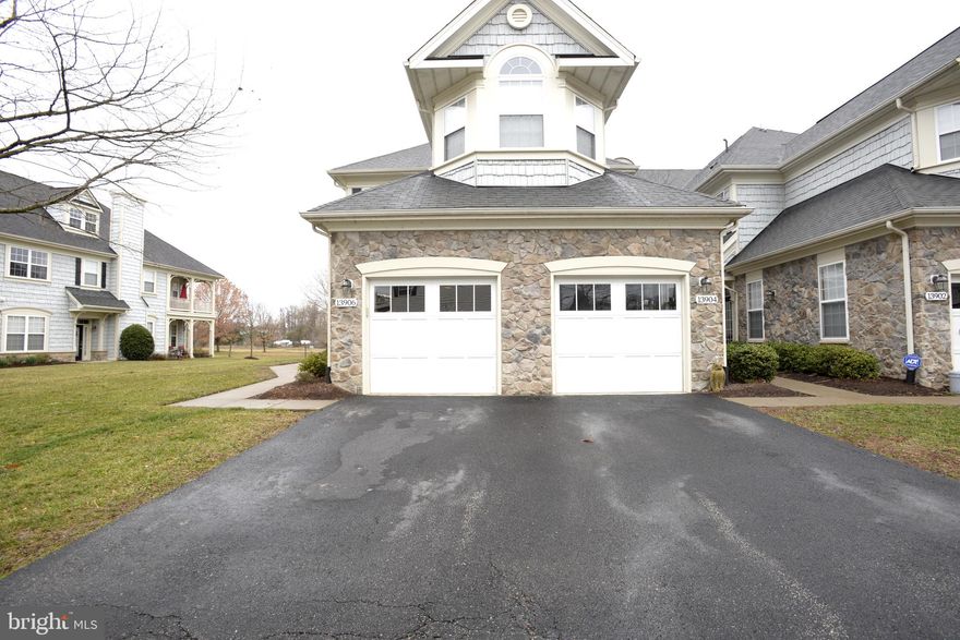 Move-in  just in time to enjoy Spring and all this community has to offer!  Location, Location, Location!  Come take a look at this rare end unit in the sought-after Belmont Bay Community.  You will be amazed at this spacious beautiful floor plan showcasing an abundance of natural lighting in this 3 BD, 2 BA, 1 Car Garage home. The kitchen has granite countertops and backsplash, ceramic tile, kitchen island, and stainless steel whirlpool appliances.  Spacious laundry, large bathrooms, large master suite, second bathroom and plenty of storage await you. This home is move-in ready with new carpet (installed Dec 2019).   You can walk to the marina, indulge in the community pool and enjoy the natural beauty of the walking trails and Golf Course in this community.  Your new home awaits with lower level, one level living!! The VRE and nearby commuter lots make this a great commuter location. Jump on the VRE and commute to Quantico MCB, Ft. Belvoir, Pentagon, DC or to Crystal City Amazon HQ2. A $600.00 home warranty is offered.