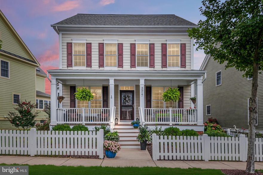 This beautiful Mainstreet Ashley model home in the Villages of Urbana has it all! Relax with your morning coffee on the spacious front porch. Entertain on the spacious two-level patio in the backyard private oasis. This home features well-thought-out spaces throughout. The main level includes a formal living room, formal dining room, family room with fireplace, and a spacious gourmet kitchen. The luxe owner's suite features a beautiful volume ceiling, a large walk-in closet, and a spacious bathroom with a separate shower and soaking tub. The second-level features two additional large bedrooms and a convenient laundry area. The finished lower level features a full bath, bonus room (with potential use as a bedroom), storage area, and spacious recreation and living areas. Plenty of parking with a two-car garage and extra parking in the rear alley (rare in the Villages of Urbana)! Don't miss your opportunity to live in the Villages of Urbana--with its sought-after amenities, including two pools (including the resort-style pool with the lazy river), a work-out facility, and the Village Marketplace with restaurants, a grocery store, and a huge library! ***A Zillow 3D Tour is available***
