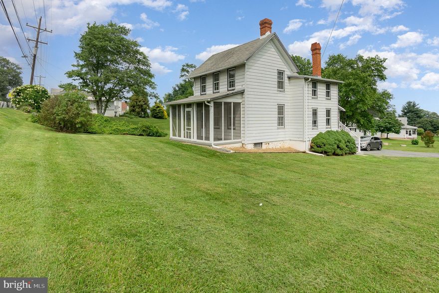 This house is in a convenient location with tremendous future growth potential. 
Pretty .73 acre lot with a relaxing rear view, yet
situated right by the busy interchange at Exit 93 of I-95 (Home of the Great Wolf Lodge).
Features an updated well (2022), updated electric wiring (2022). Updated plumbing (2022). 
Updated water conditioner (2023), Updated Luxury Vinyl Plank flooring (2022). 
Main level kitchen with granite counters and appliances.
Main level living room, dining room and half bath. 
Second level bedroom with pass thru bedroom, 3rd bedroom and full bath. 
Corner lot with large off street paved driveway.
Screened porches on front and rear. Vinyl rails and Composite stairs on rear.
Full basement with level walk out, new dual sump pumps, water treatment and washer & dryer. 
3000 gallon Holding Tank.