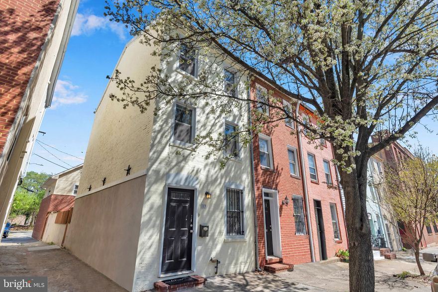 Offer Deadline Tuesday April 15th @12 noon. This beautiful 3 level end unit townhome in Mount Clare has 3 bedrooms and 2 full baths. Freshly painted throughout, this home features a spacious living room with recessed lighting. The primary suite on the top floor has two closets with a large bathroom with double vanities and a walk-in shower. Recess lighting and hardwood floors throughout the entire property.  The kitchen features stainless steel appliances, built-in microwave, granite countertops, and ceramic tile flooring. Heated floors in kitchen. Separate heating unit in living room. Patio offers privacy and space for leisure and entertainment. Basement includes sump pump and can be used for storage. Schedule your showing today!