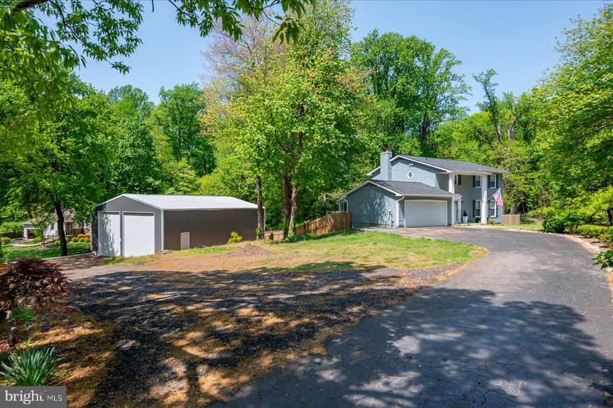 Located on nearly one acre in Arnold, 136 Collington Court combines land, functionality, and a comprehensive 2024 renovation. The property includes a newly constructed detached 36' x 48' shop in addition to an attached two-car garage, providing four total garage spaces.

The home offers five bedrooms, three full baths, one half bath, and a finished walkout lower level with direct access to the fenced backyard. The 2024 renovation included updates to interior finishes, creating a cohesive, move-in ready residence.

Situated within the Broadneck Peninsula, the property offers convenient access to Route 50, Downtown Annapolis, the U.S. Naval Academy, and commuter routes to Baltimore and Washington, D.C. The nearby Baltimore & Annapolis Trail provides miles of paved paths for walking, running, and cycling. Residents also enjoy proximity to local marinas, waterfront dining, parks, and Broadneck schools, all while maintaining the benefit of a nearly one-acre setting.