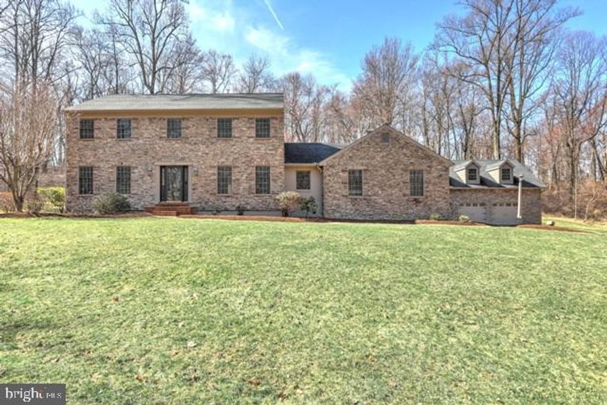 Tall trees create a screen of privacy, while filtering soft cascades of light and shade, for this beautiful custom home set on 5.27 acres, in beautiful Laurel Estates, Eastern Schools. Awake to the morning serenade of songbirds; walk or ride the community trails; fish Laurel Estates creek located at the bottom of Laurel Drive; tinker in the finished 3-car garage with 1/2 bath, woodstove and bonus room above it; or just relax and take in the view....Spacious home with hardwood floors, some Brazilian Cherry; 1st floor family room with brick fireplace; additional step-down family room with bar area; master suite with gorgeous master bath; large deck and second deck with pergola and don't forget that awesome garage space!  Room to expand in the lower level, 13 course, bath rough-in. It's the ideal place to escape the world! Country quiet, yet minutes to Rt30, the river,  recreation, conveniences and more!