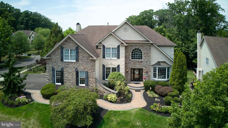 Welcome to 3794 Powder Horn Drive, an exquisite residence nestled in the highly sought-after Buckingham Forest community. This expansive home, boasting over 5,500 sq ft , offers an exceptional blend of luxury and functionality, ensuring it meets all your needs. From the moment you arrive, you'll be captivated by its stunning curb appeal and professional landscaping, maintained by a comprehensive lawn sprinkler system. Upon entering, the grandeur of the soaring foyer immediately welcomes you. The first floor showcases elegant wood flooring throughout and features an office adorned with French doors and built-ins, creating an ideal space for productivity. Architectural columns, chair railings, and beautiful crown molding gracefully delineate the formal living and dining rooms, adding a touch of sophistication to the ambiance. The heart of this home is its gourmet kitchen, which boasts a granite island, updated appliances, and a vented downdraft cooktop. The bump-out eating area provides the perfect space for casual dining and leads to a deck offering scenic views and a fully fenced backyard, ideal for outdoor dining and entertaining. Adjacent to the kitchen, the family room is a showstopper with its floor-to-ceiling stone fireplace, a wall of windows that flood the space with natural light, and a rear staircase adding an extra touch of elegance and convenience. The back staircase guides you to the spacious master suite, a private retreat complete with a tray ceiling, a cozy sitting room, and multiple closets for ample storage. The luxurious master bath features a two-person whirlpool tub, a double shower, and double vanities, creating a spa-like experience at home. A princess suite with a private bath and two additional bedrooms sharing a Jack-and-Jill bathroom ensure ample space and privacy for family and guests. The finished walk-out basement is truly an entertainer's dream. It features a wet bar with display cabinetry, ample space for gatherings, and a complete theater with seven reclining seats that vibrate with the film action, making it perfect for movie nights. The basement also includes an exercise room, a second office or potential 5th bedroom, and a bathroom, offering versatility to suit your lifestyle. The three-car garage provides additional storage opportunities, enhancing the functionality of the home.
Situated within the award-winning Central Bucks School District, this home is conveniently close to the cultural and recreational amenities of Doylestown, the charming attractions of New Hope, the convenience of Newtown, and the accessibility of New Jersey.