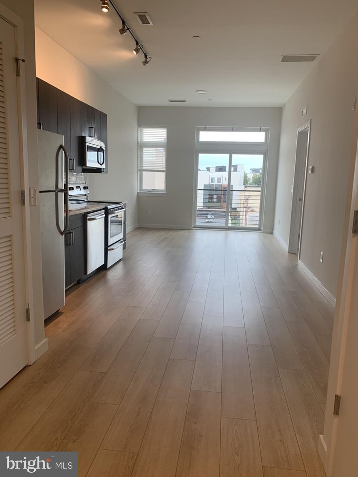 Spacious 2 bed, 1 bath in Northern Liberties and just steps from Fishtown! PRICE REFLECTS 1 MONTH FREE ON A 13 MONTH LEASE! Base rent is $1840/month. This 2nd floor apartment in newly constructed 18 W. Girard comes with washer dryer in unit, stainless steel appliances, hardwood floors, juliet balcony and an open floorplan with an elevator in the building, bike storage and pet friendly! Come and check it out before it's gone! First and half month security for qualified tenants due at lease signing. Pets welcome for $25/month and a 1 time $250 deposit. This is a non-smoking building.