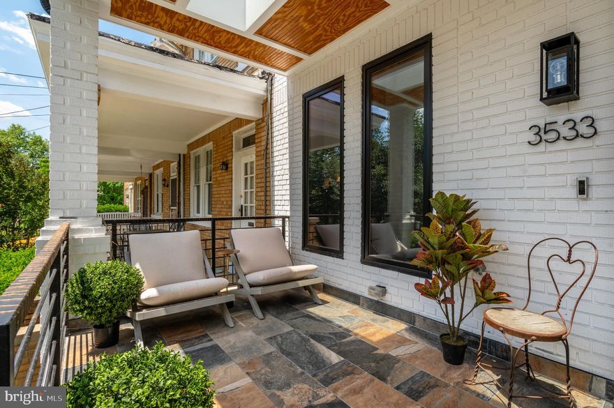 Broker OPEN TUESDAY 12-2 and CLIENTS are WELCOME.  Welcome to this exciting contemporary masterpiece offering four light filled levels artfully designed for todays living and just three years young!  Captivating in its top of the line finishes and custom windows, with hardwood floors throughout.  The main level welcomes you with an inviting front porch opening into the high ceiling living room, designer gourmet kitchen with island, dining area and warm welcoming family room -- all of which overlook  a beautiful and deep entertaining deck with lush green landscaping and a private two car parking pad.  Custom glass bannisters escort you up to the second level which provides two bedrooms each with ensuite bath plus a bonus sliding glass entryway into the centrally located  office/exercise room.  The owners suite encompasses the entire top story of the home.  An elegant owners bath with tub and glass shower opens to a private rooftop deck allowing for a peaceful retreat perfect for a reading nook.  Custom closets galore along with a small balcony off the owners spacious bedroom allow for views over the entire lush green landscaping and lower level deck.  The daylight lower level of the home lives like its own guest suite with full bedroom and bath, an additional office or storage room, a complete second kitchen with ample  living/family room plus front and back doors to the exterior outdoor living spaces.  A two car parking pad completes this rare offering in sought after Burleith.  Two blocks to Wisconsin Avenue, and just five blocks to Georgetown University and Hospital.  This special offering is a contemporary lovers dream home.  A total of 4 bedrooms, 2 offices/dens, 4.5 baths and just over 3,000 square feet with fabulous outdoor entertaining spaces and private 2 car parking.  TESLA ELECTRIC  VEHICLE CHARGING STATION conveys!