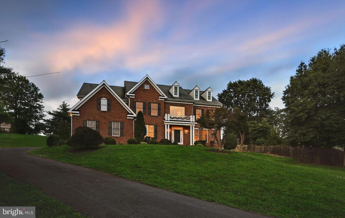 Salona Village is one of McLean’s most desirable neighborhoods, perfectly combining luxury and convenience. This exceptional brick-front home offers approximately 7,000 sf of living space on a spacious 0.88-acre lot, just a short walk from top-rated schools, downtown McLean, Lewisville Athletic Park and farmer's market. The grand two-story foyer sets the tone for elegance and sophistication. The gourmet kitchen equipped with Monogram range and refrigerator—perfect for culinary enthusiasts. With 5BR, 5BA, private office, formal Living Room, Dining Room, Family room and a two-car garage, this home offers both comfort and style. The fully finished basement adds versatility with a spacious open recreation room, bedroom, and a full bath and bonus media or gym—ideal for entertaining. This home can be professionally furnished and rented for a short period of time. Shows like a model home! Ready now.